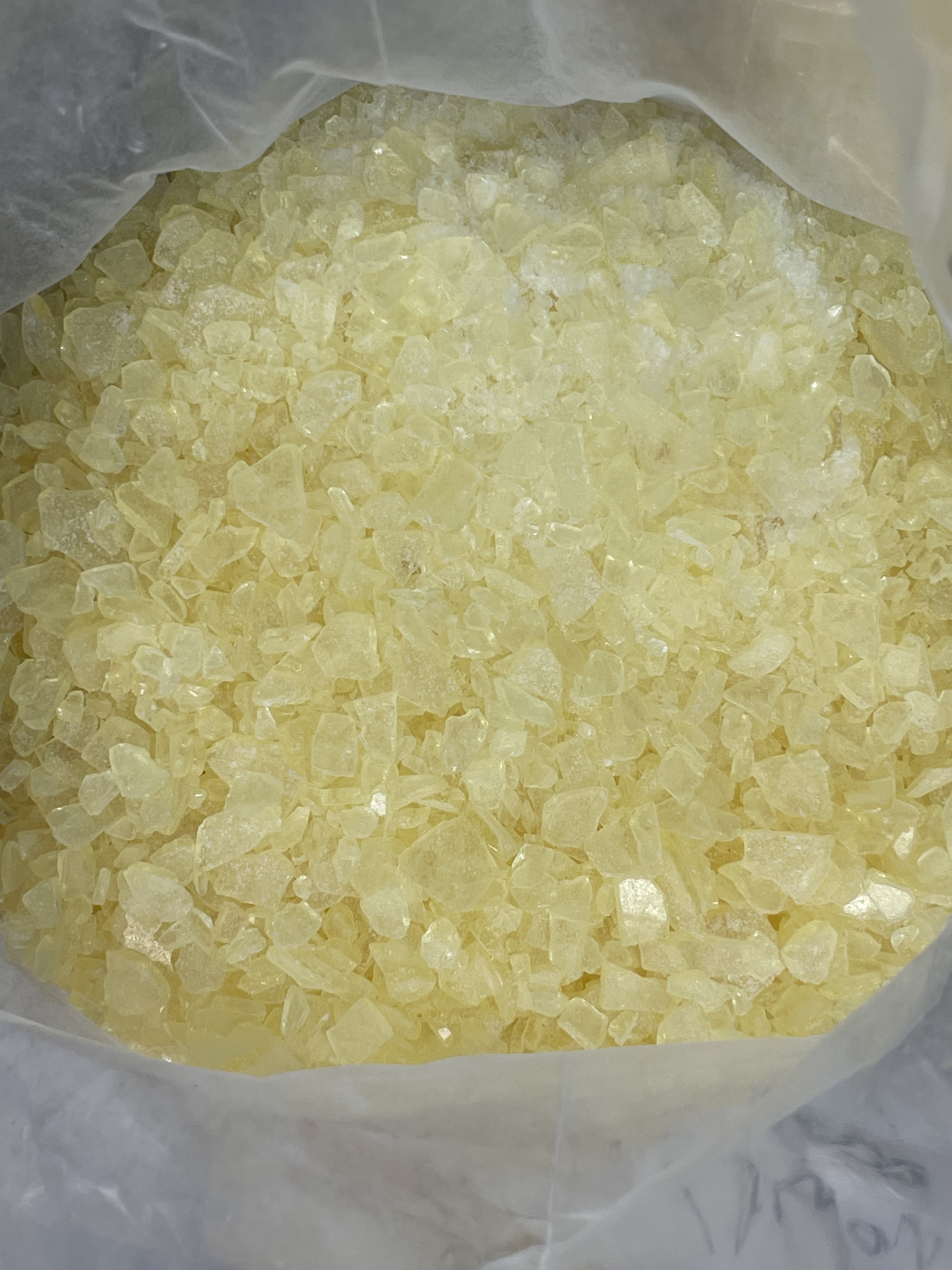 Pale yellow flakes of resin used as an additive in adhesives and sealants.